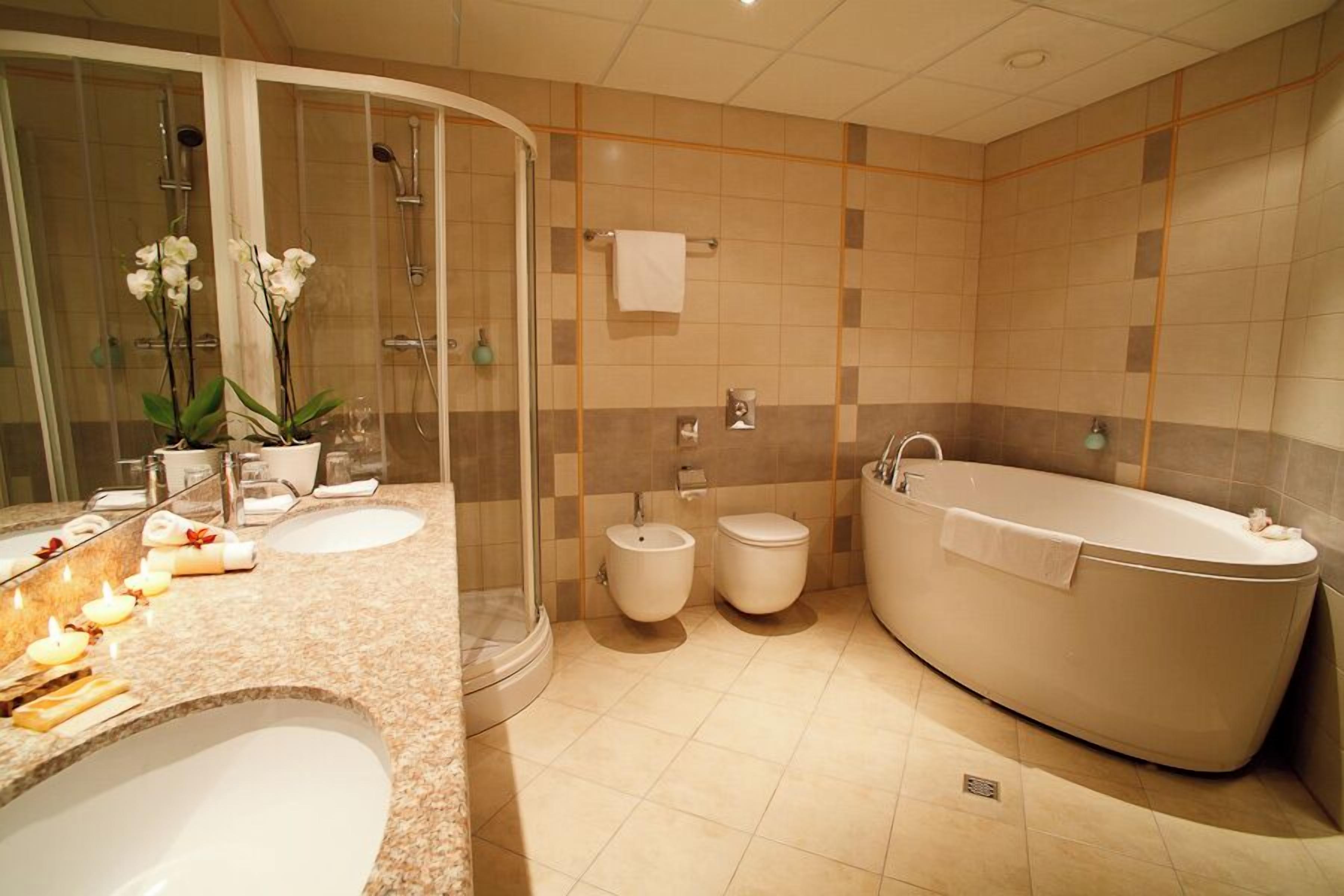 superior apartment | bathroom | free toiletries, hair dryer, towels, soap