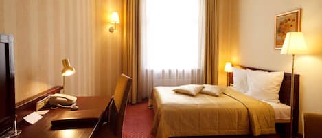 Standard Double Room | Minibar, in-room safe, desk, blackout drapes