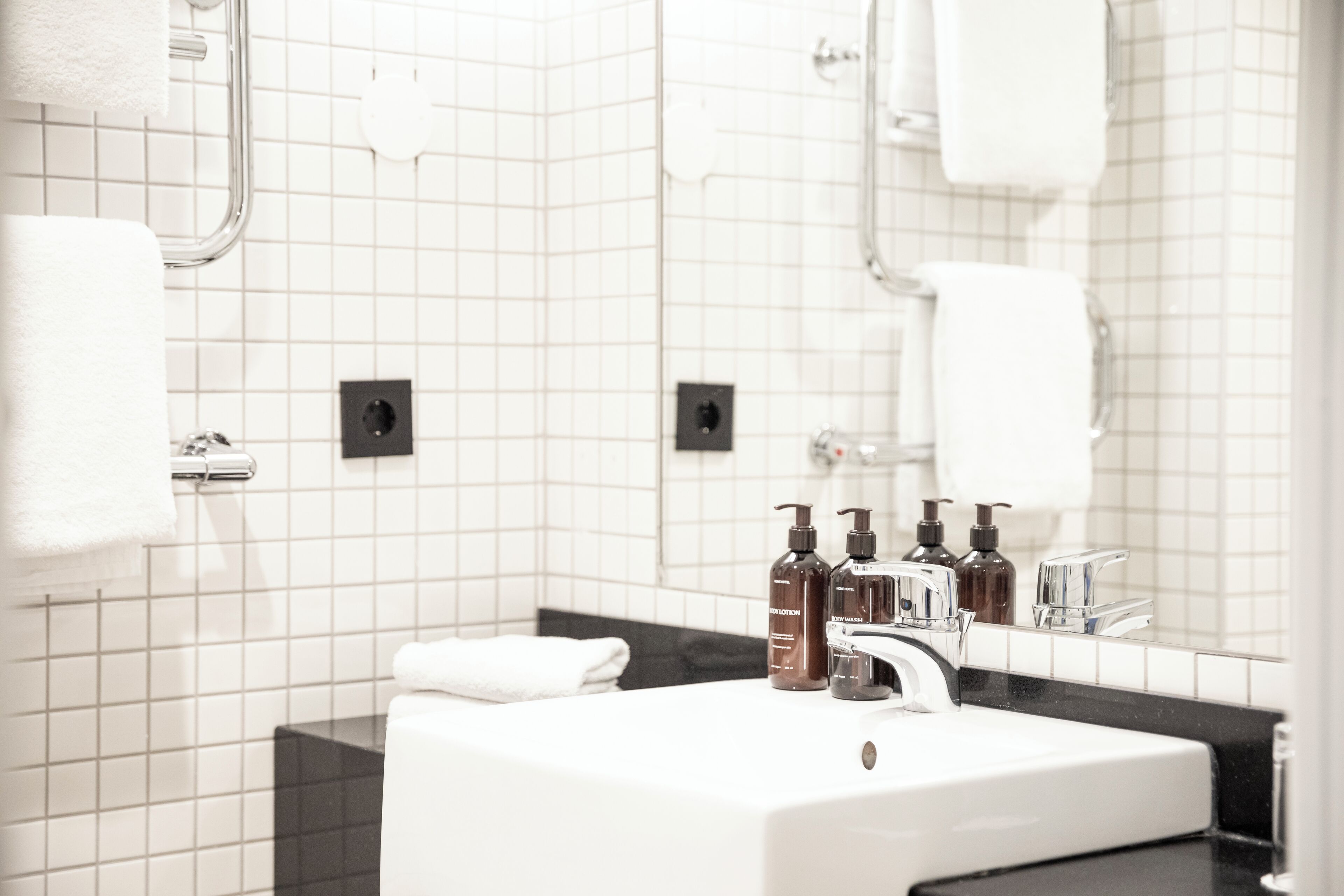 deluxe room, 1 king bed | bathroom | designer toiletries, hair dryer, heated floors, towels