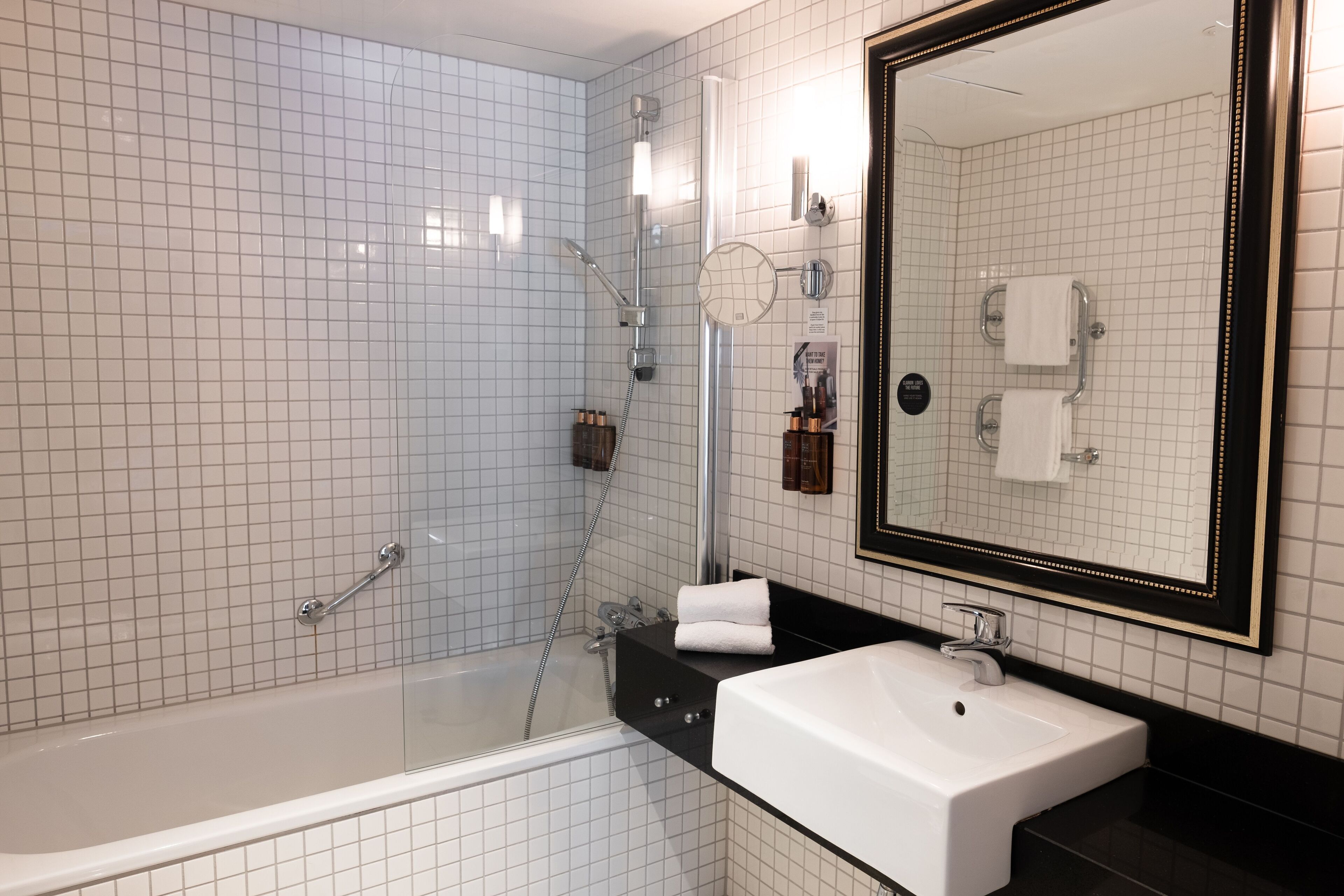 designer toiletries, hair dryer, heated floors, towels