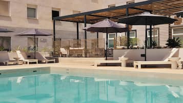 Outdoor pool, sun loungers