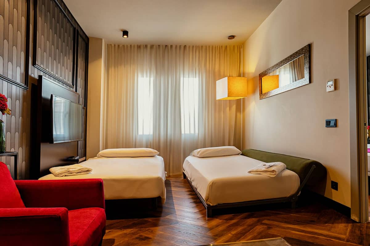 Family Quadruple Room | 1 bedroom, minibar, in-room safe, desk