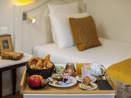 Habitación individual estándar | Colchones Select Comfort y minibar (con algunos artículos gratuitos)