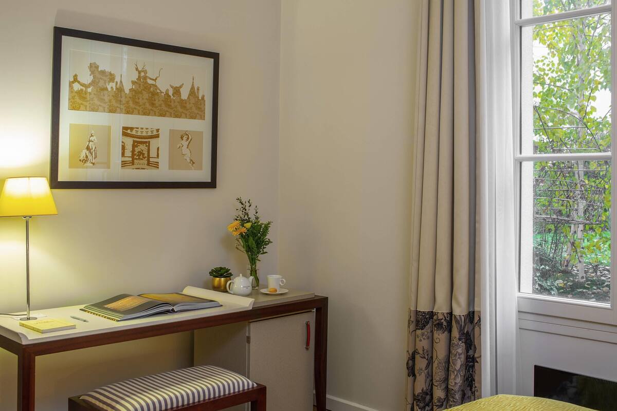 Select Comfort beds, free minibar items, in-room safe, blackout curtains
