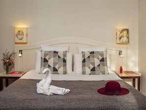 Select Comfort beds, free minibar items, in-room safe, blackout curtains