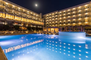 Seasonal outdoor pool, pool umbrellas, pool loungers