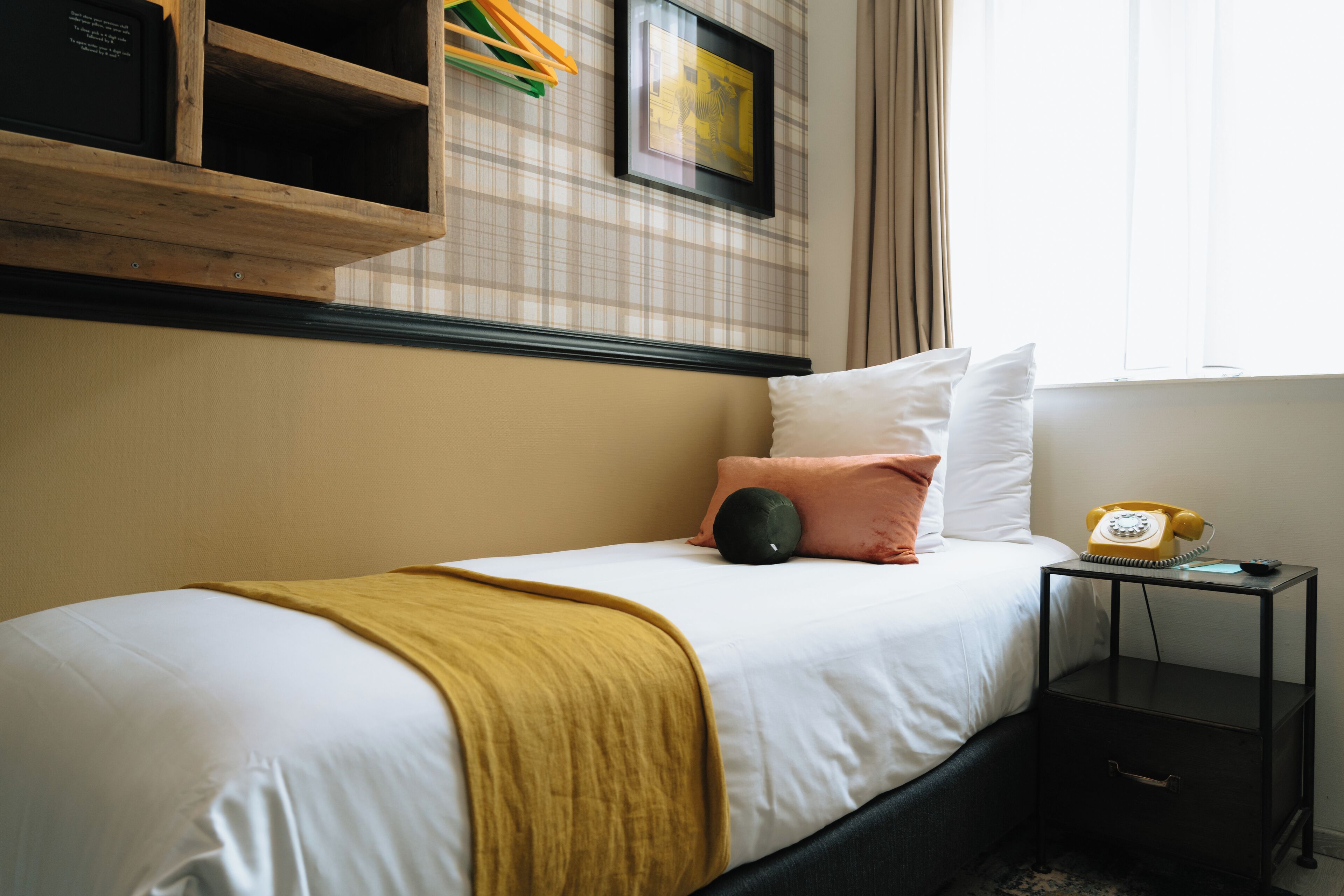 Premium bedding, down comforters, memory foam beds, in-room safe