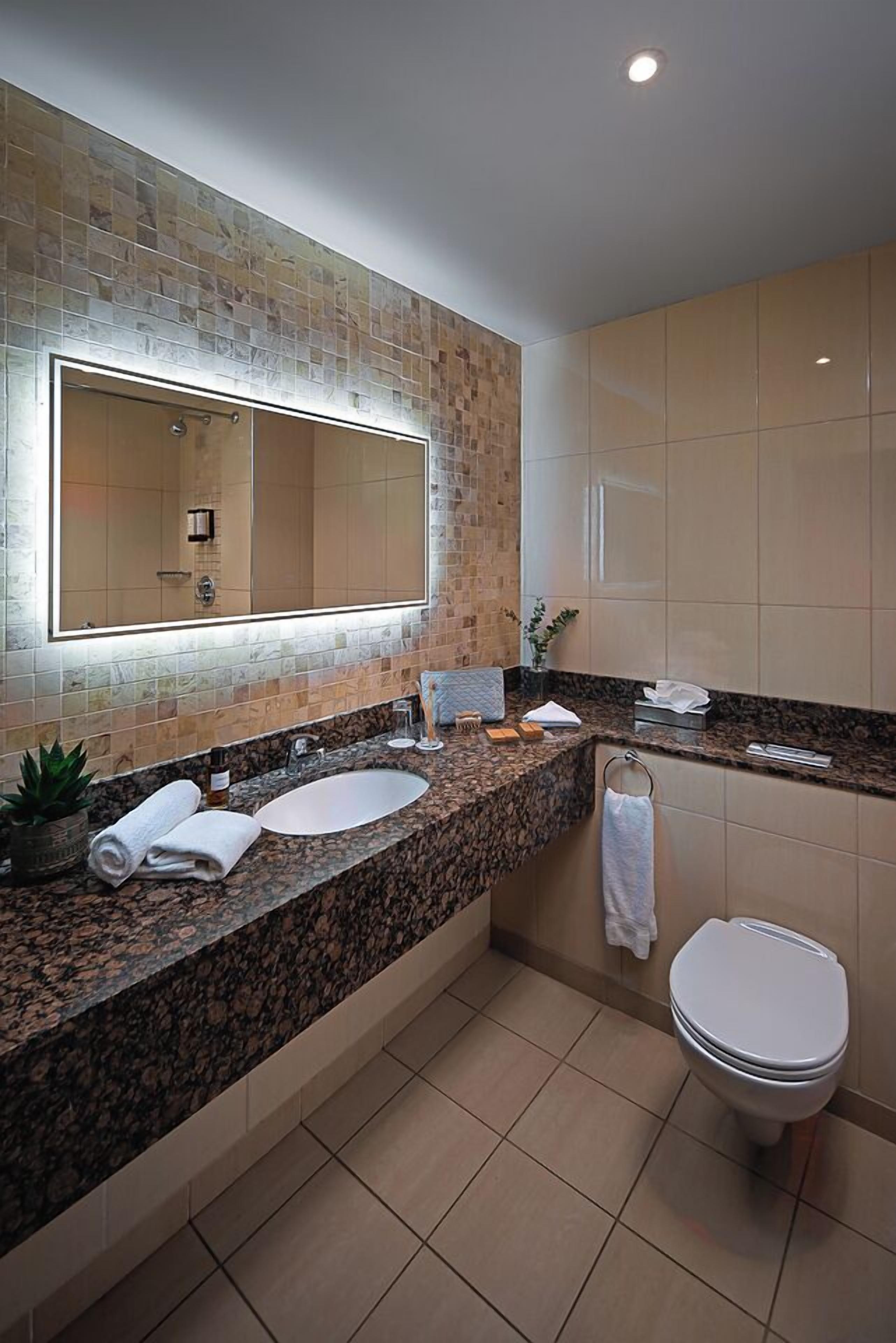 free toiletries, hair dryer, slippers, towels