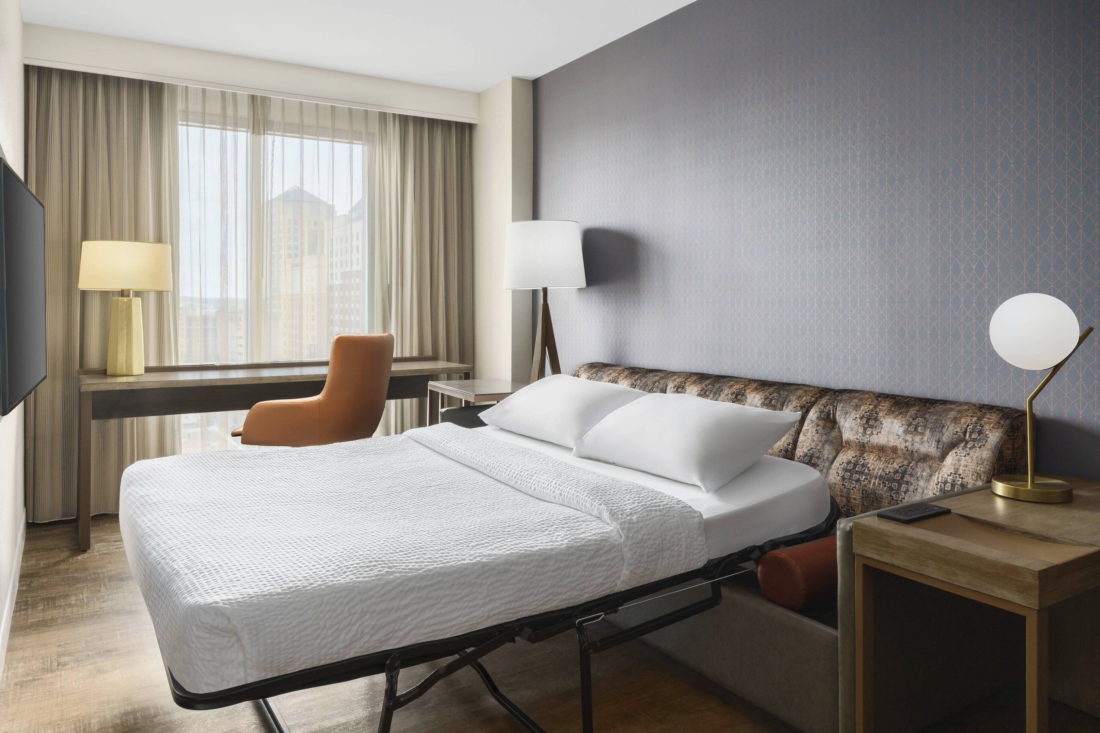 suite, 1 bedroom, non smoking | in-room safe, desk, laptop workspace, blackout curtains