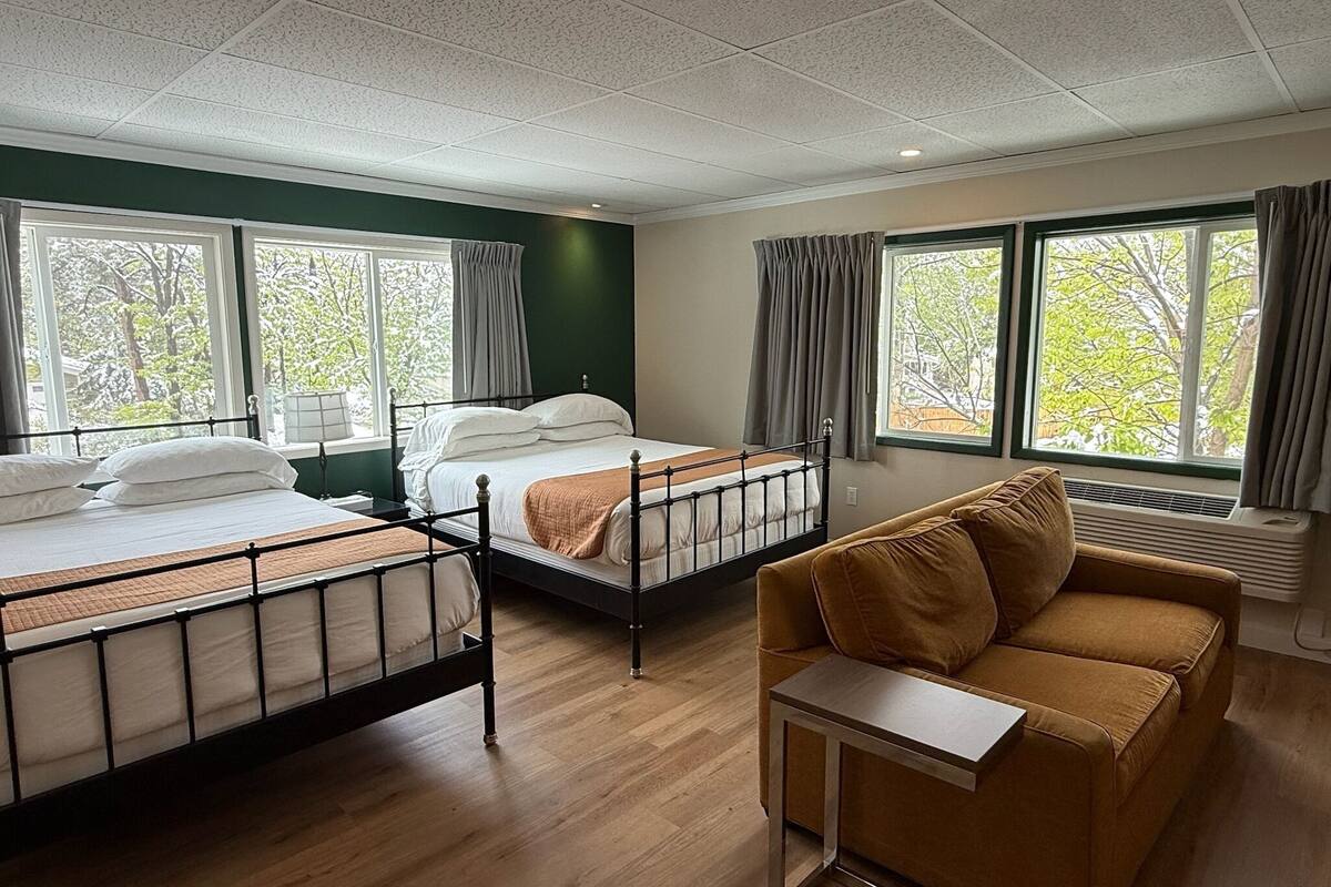 Deluxe Quadruple Room, 2 Queen Beds | Premium bedding, down comforters, in-room safe, desk