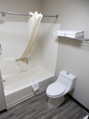 Combined shower/tub, hair dryer, towels, soap