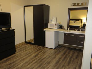 Microwave, coffee/tea maker, dining tables