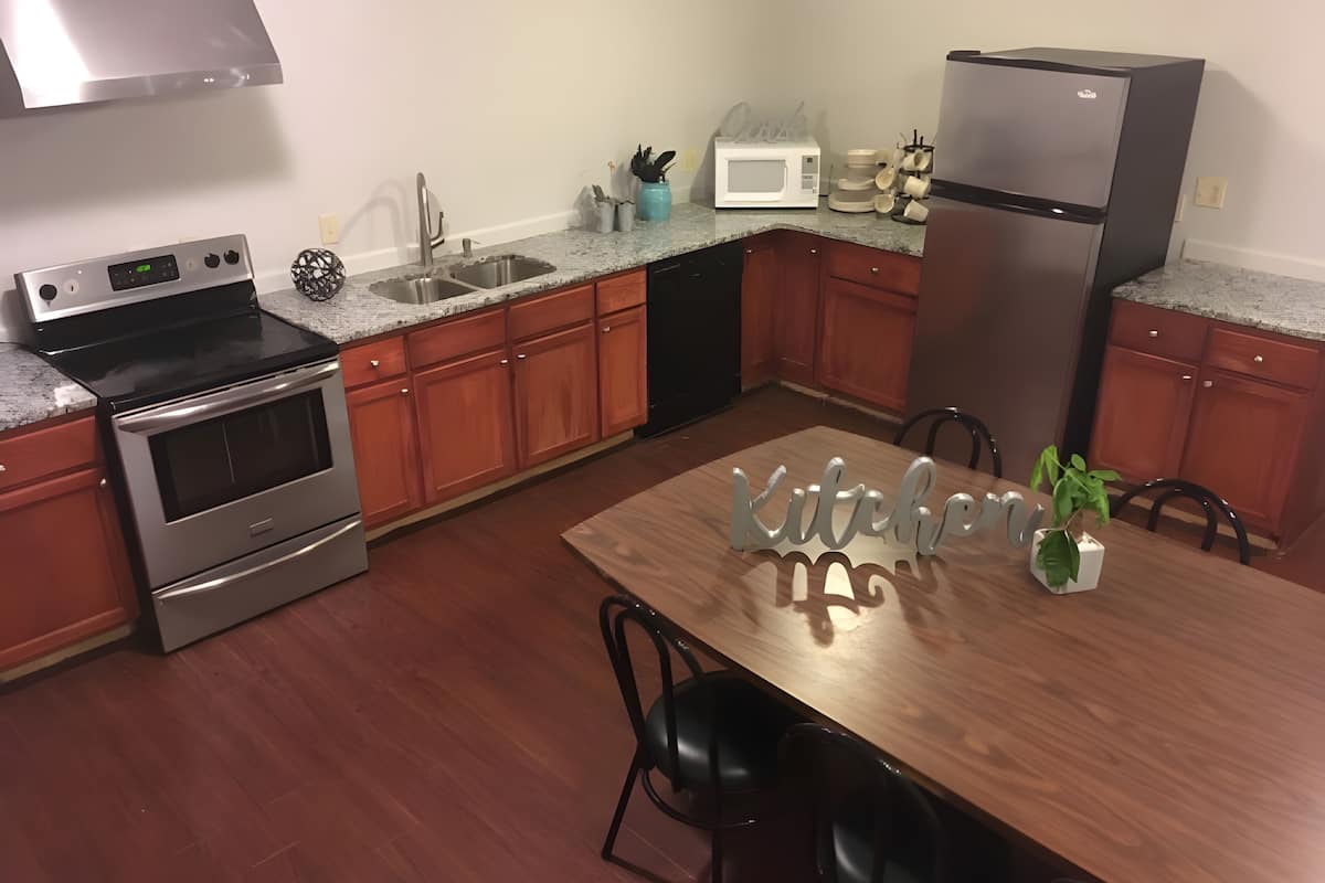 microwave, coffee/tea maker, dining tables