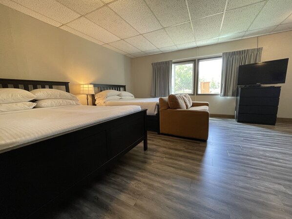 Premium bedding, down comforters, in-room safe, desk
