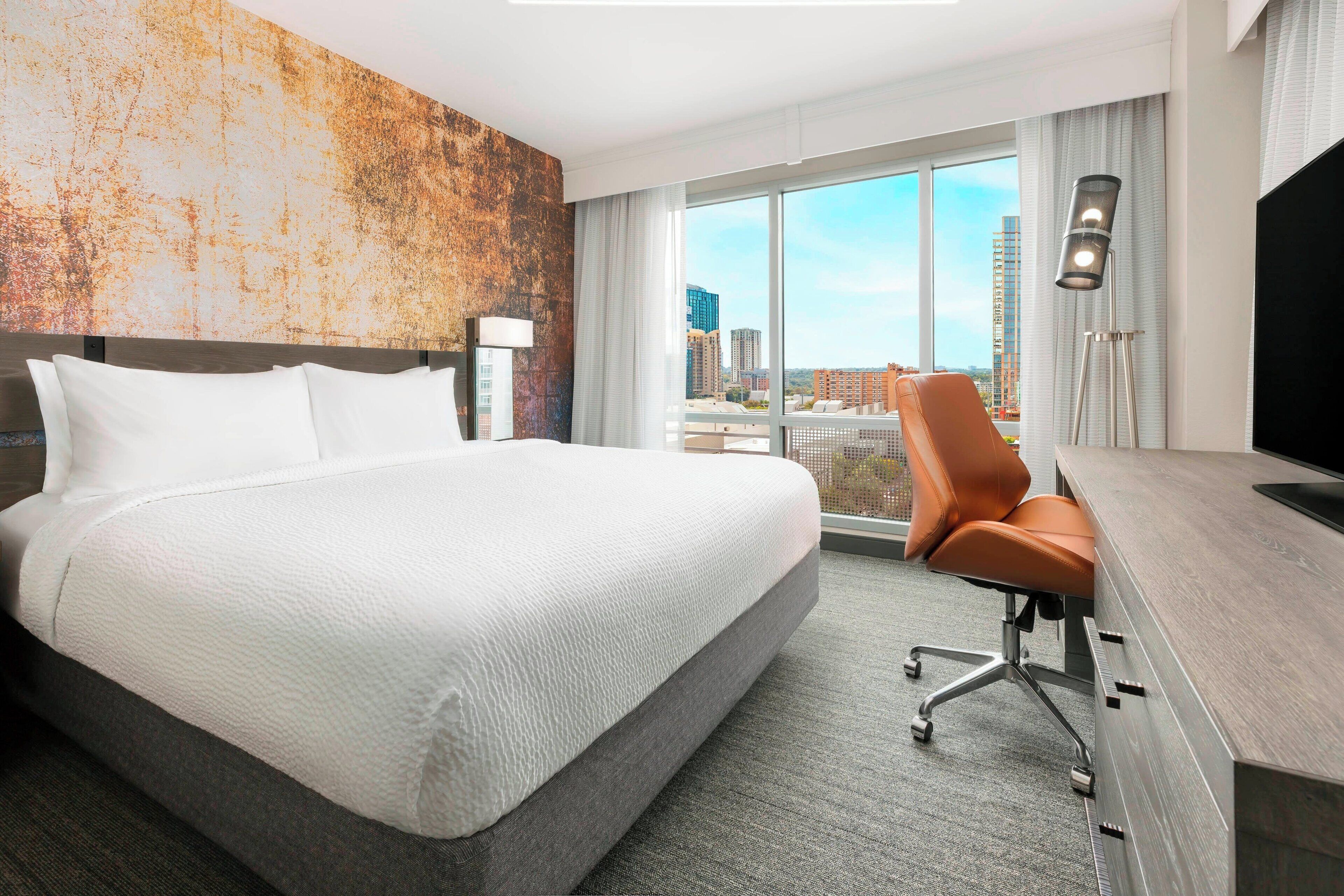 suite, 1 king bed with sofa bed | in-room safe, desk, blackout curtains, iron/ironing board