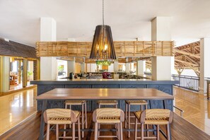 6 bars/lounges, poolside bar, beach bar