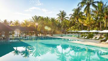 Outdoor pool, pool umbrellas, sun loungers