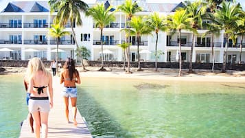 On the beach, sun-loungers, beach umbrellas, beach towels
