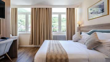 Desk, blackout curtains, iron/ironing board (on request), free WiFi