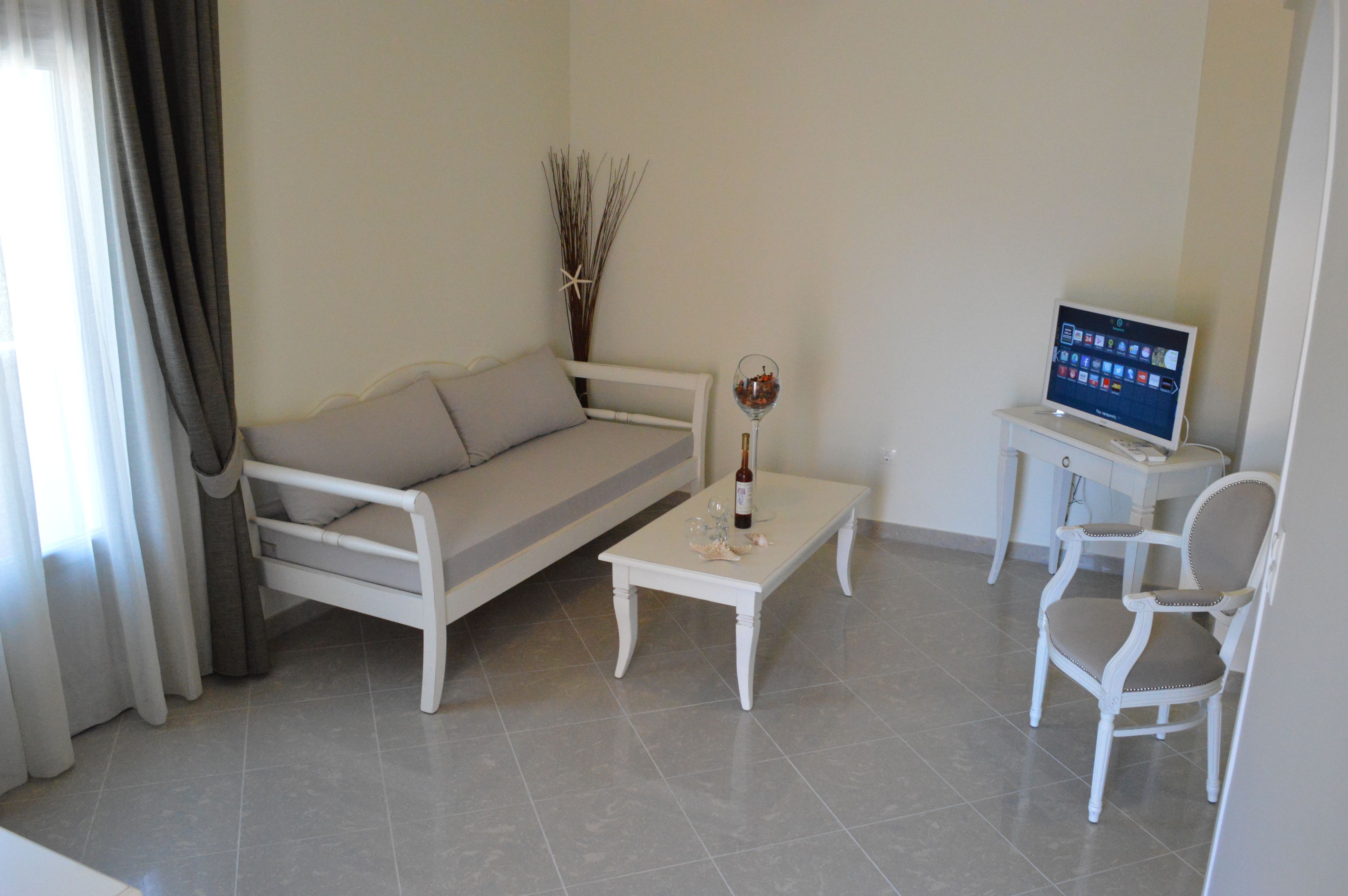 suite, sea view | living room | tv