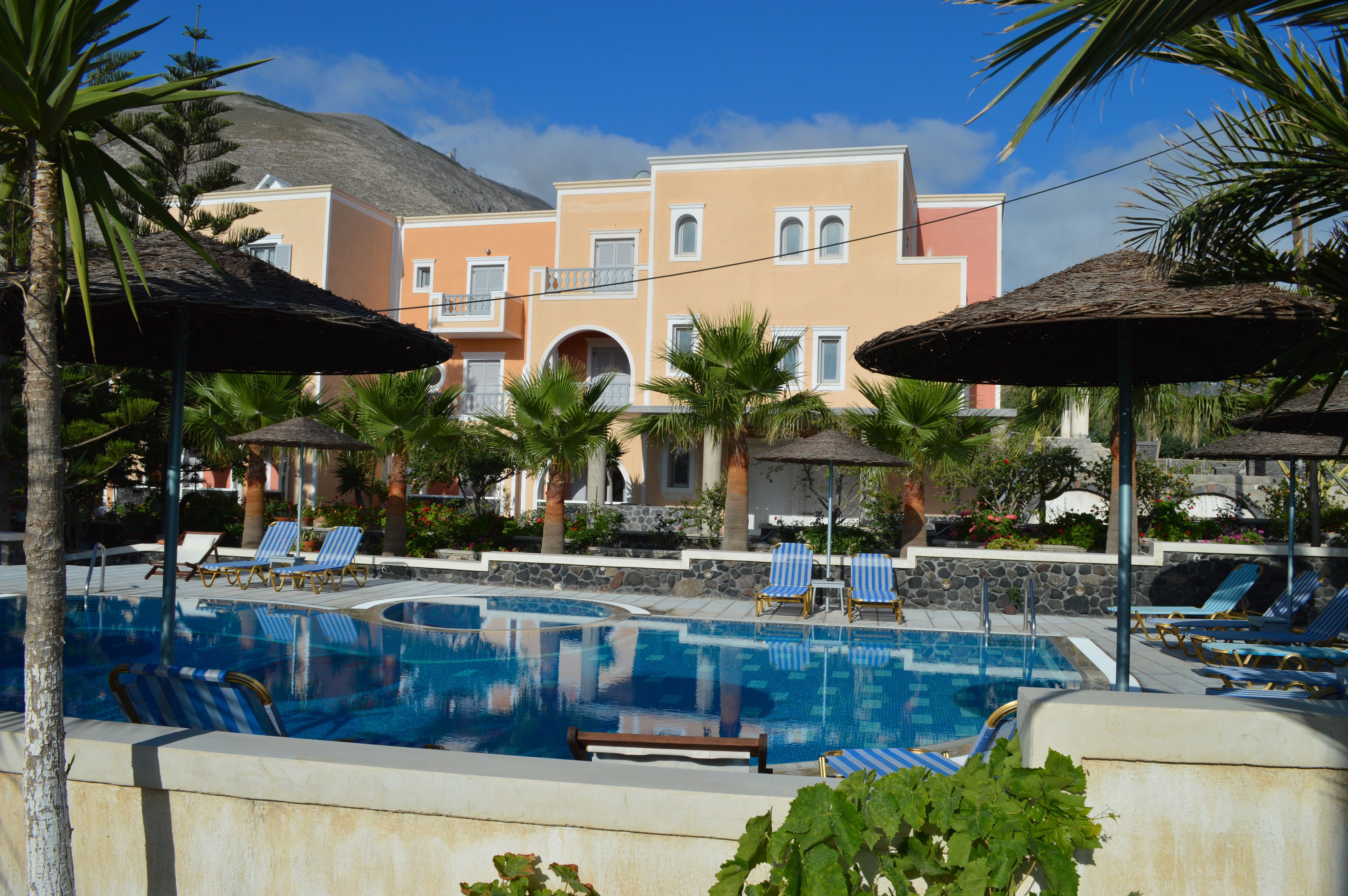 seasonal outdoor pool, open 6:00 am to 9:00 pm, pool umbrellas