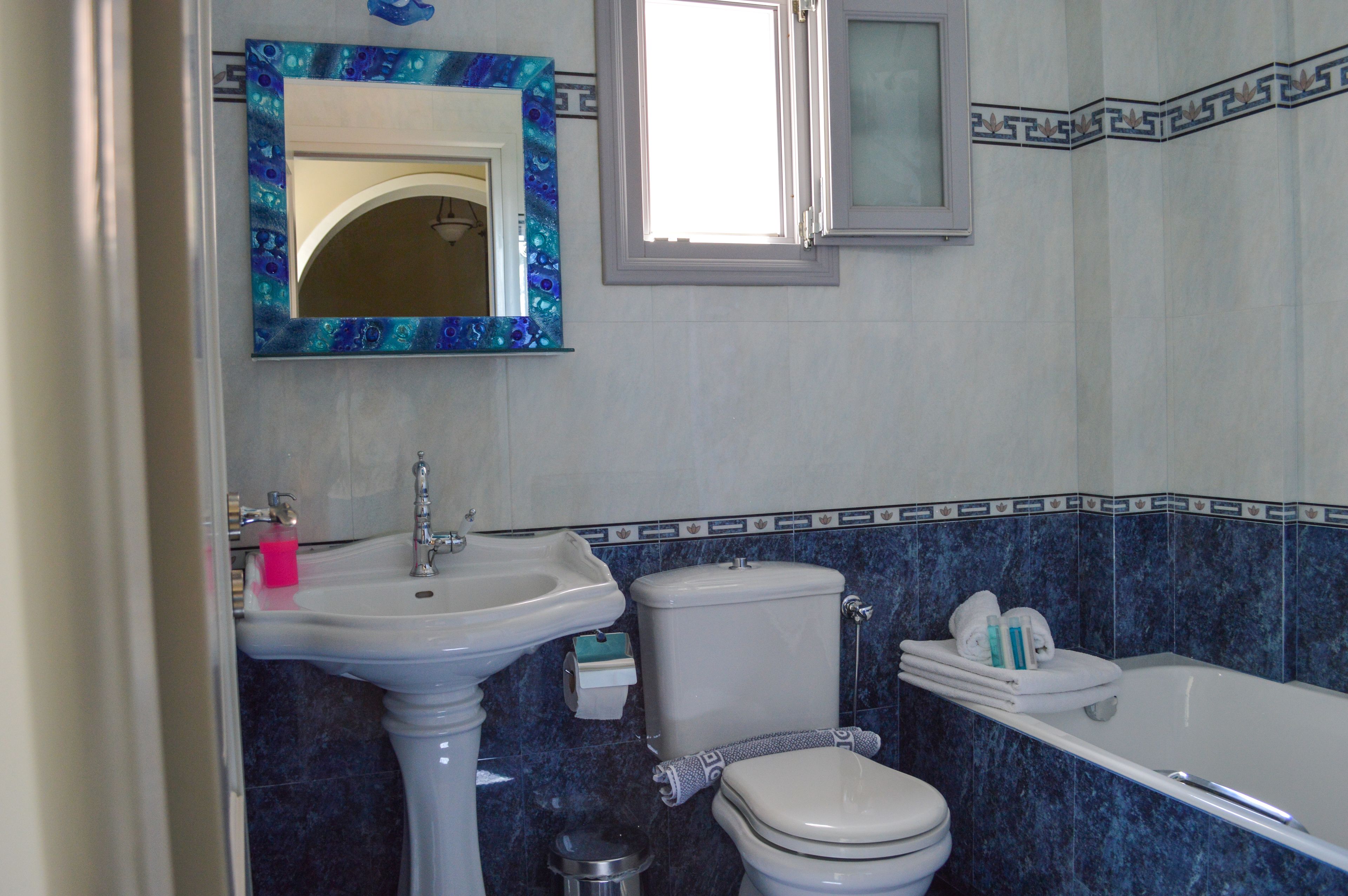 shower, eco-friendly toiletries, hair dryer, towels