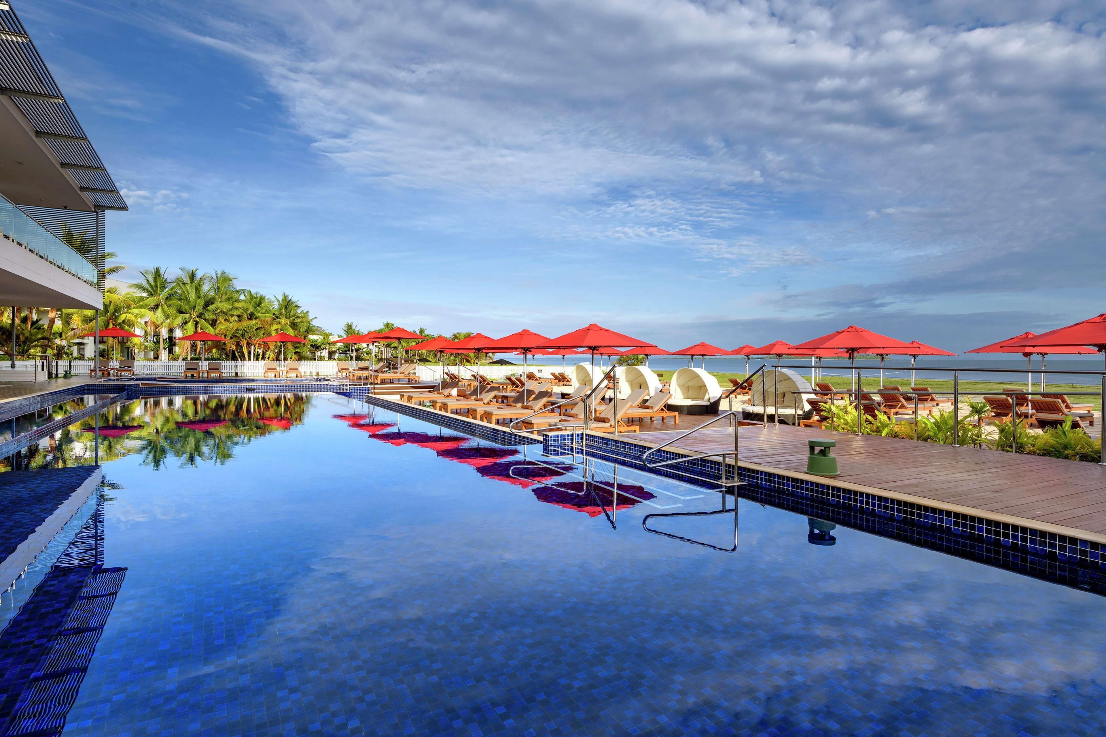 9 outdoor pools, pool umbrellas, pool loungers