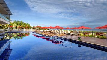 9 outdoor pools, pool umbrellas, pool loungers