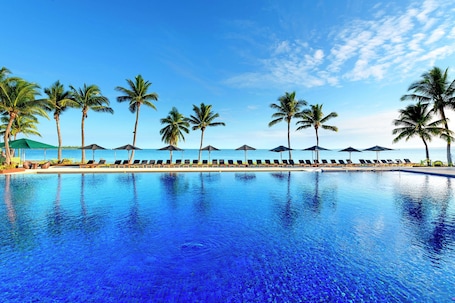 9 outdoor pools, pool umbrellas, pool loungers. Hilton Fiji Beach Resort and Spa