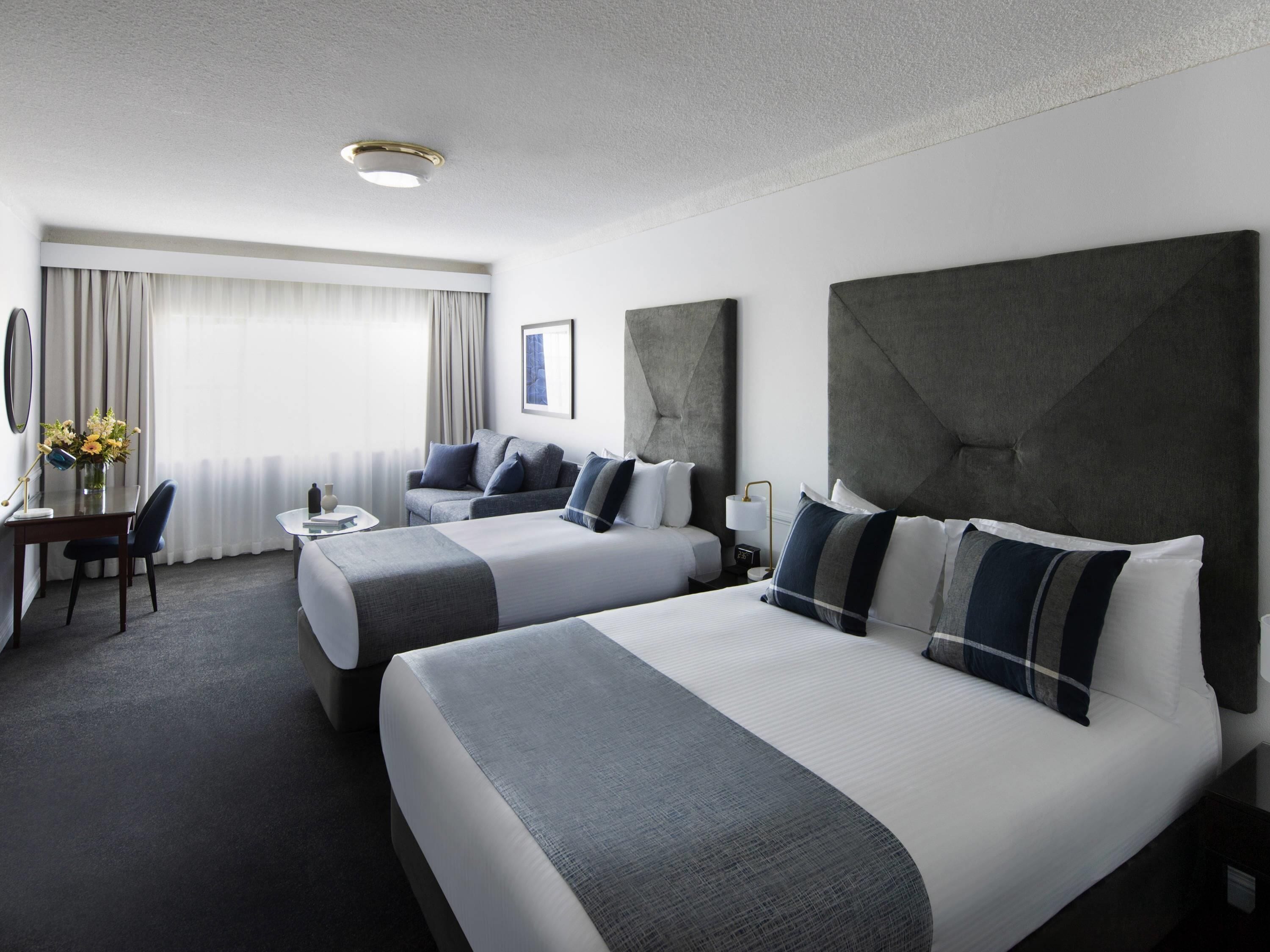 Premium Room, Multiple Beds | Premium bedding, pillowtop beds, in-room safe, desk