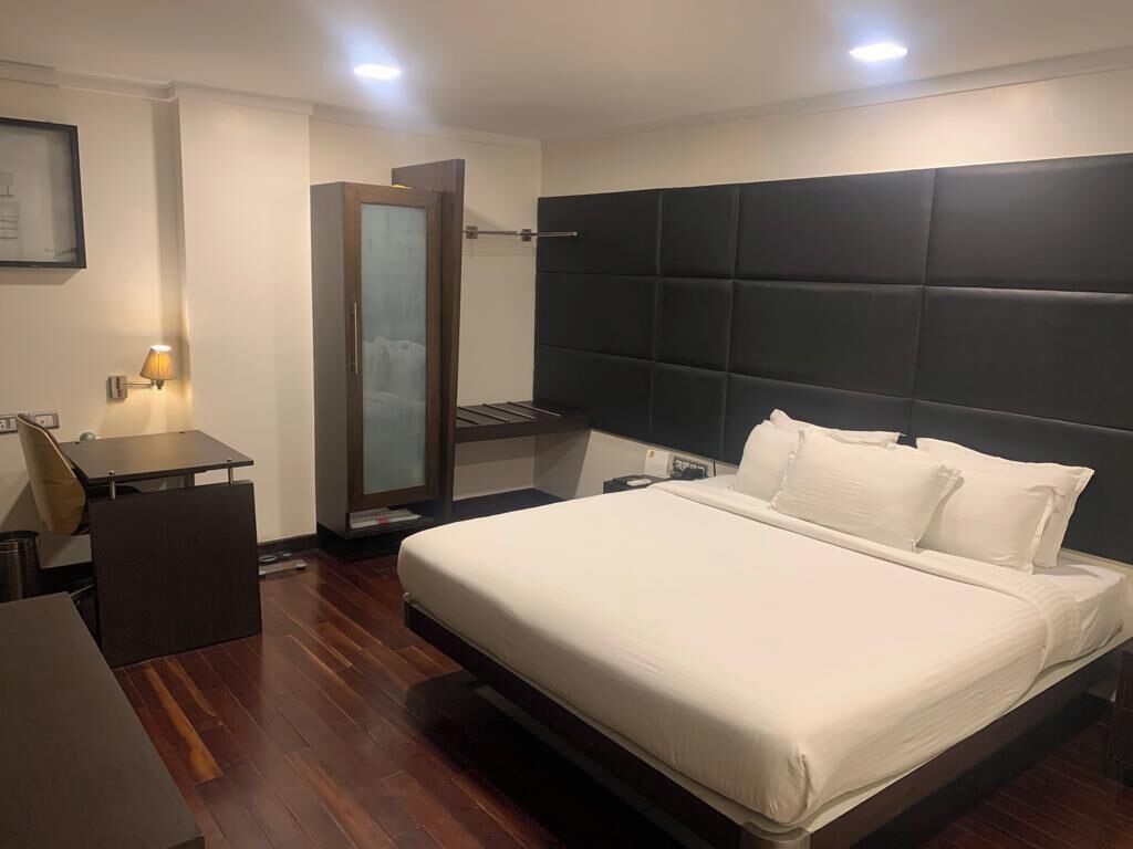 Egyptian cotton sheets, down comforters, Select Comfort beds, minibar