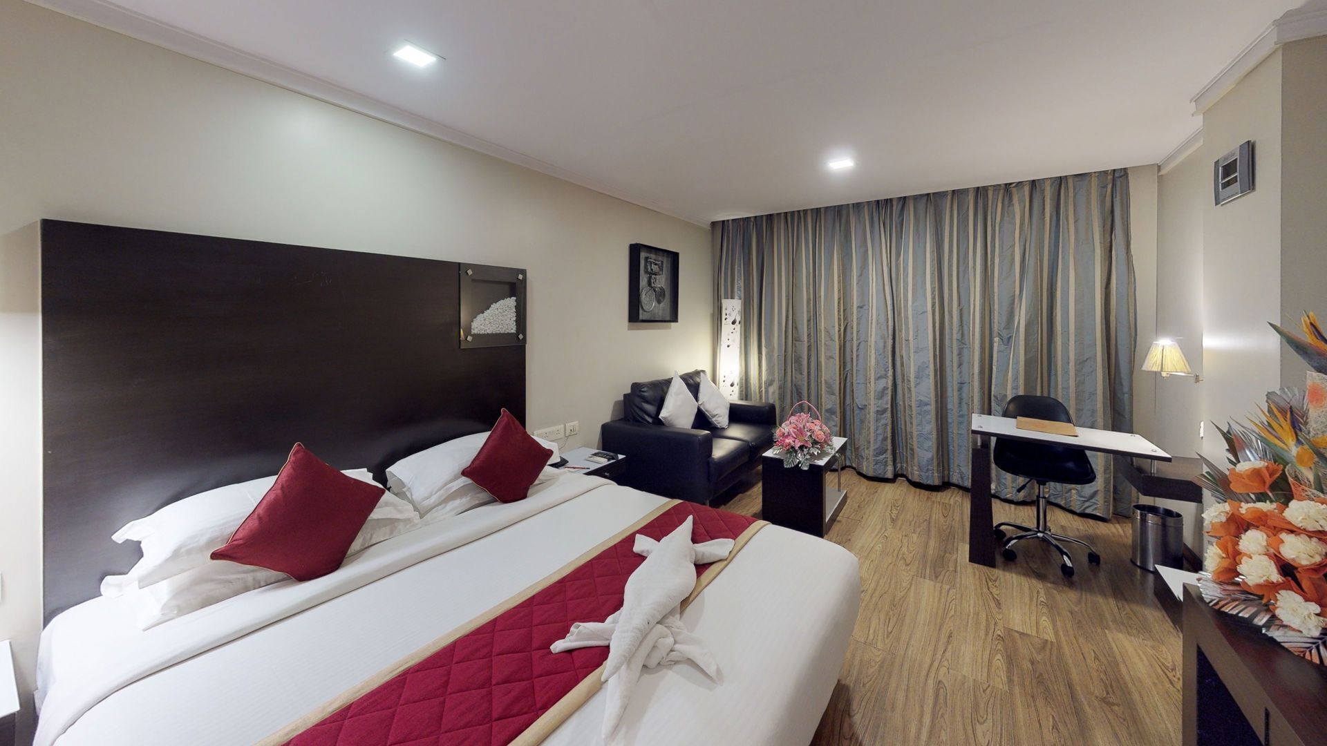 Egyptian cotton sheets, down comforters, Select Comfort beds, minibar