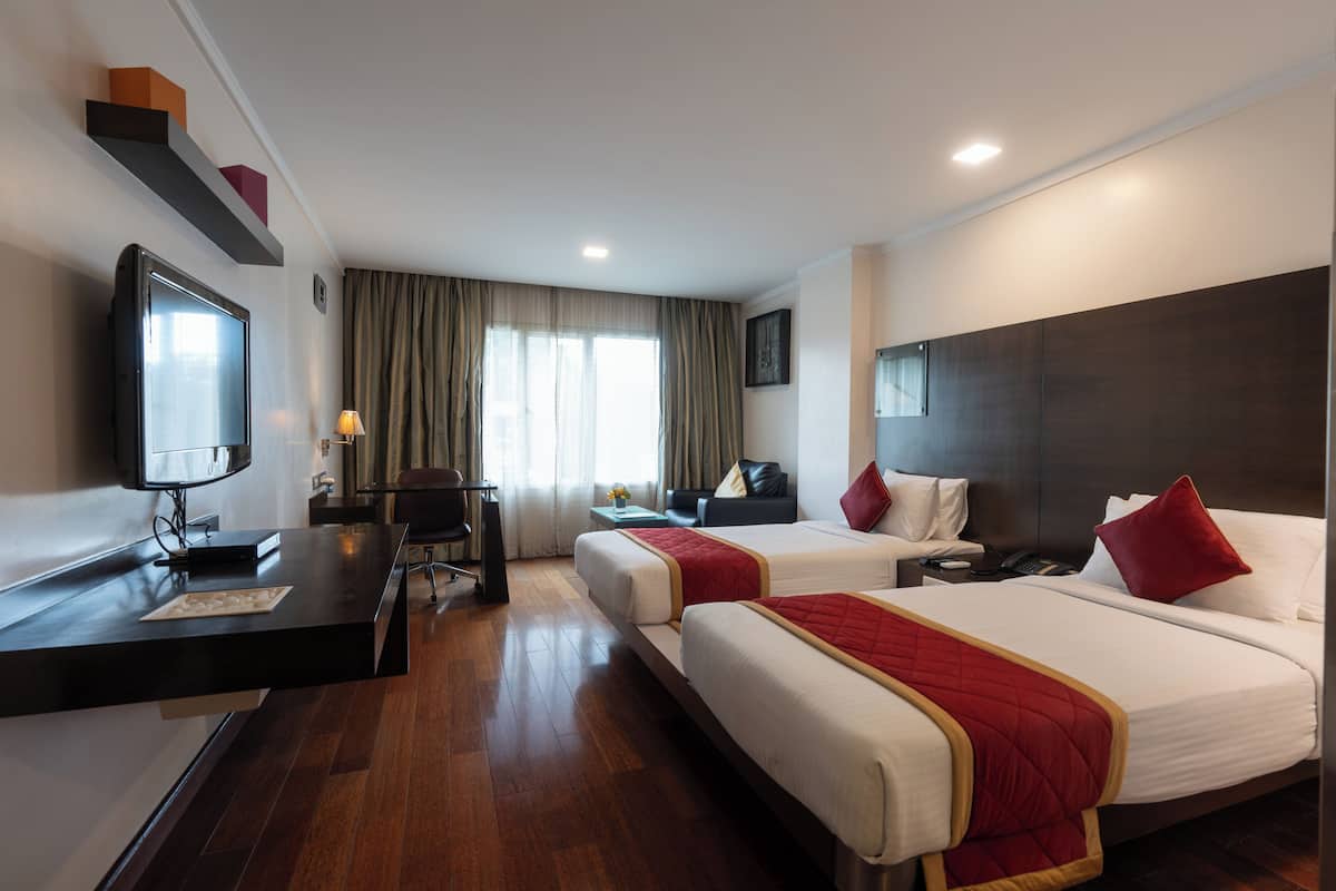 Egyptian cotton sheets, down duvets, Select Comfort beds, minibar