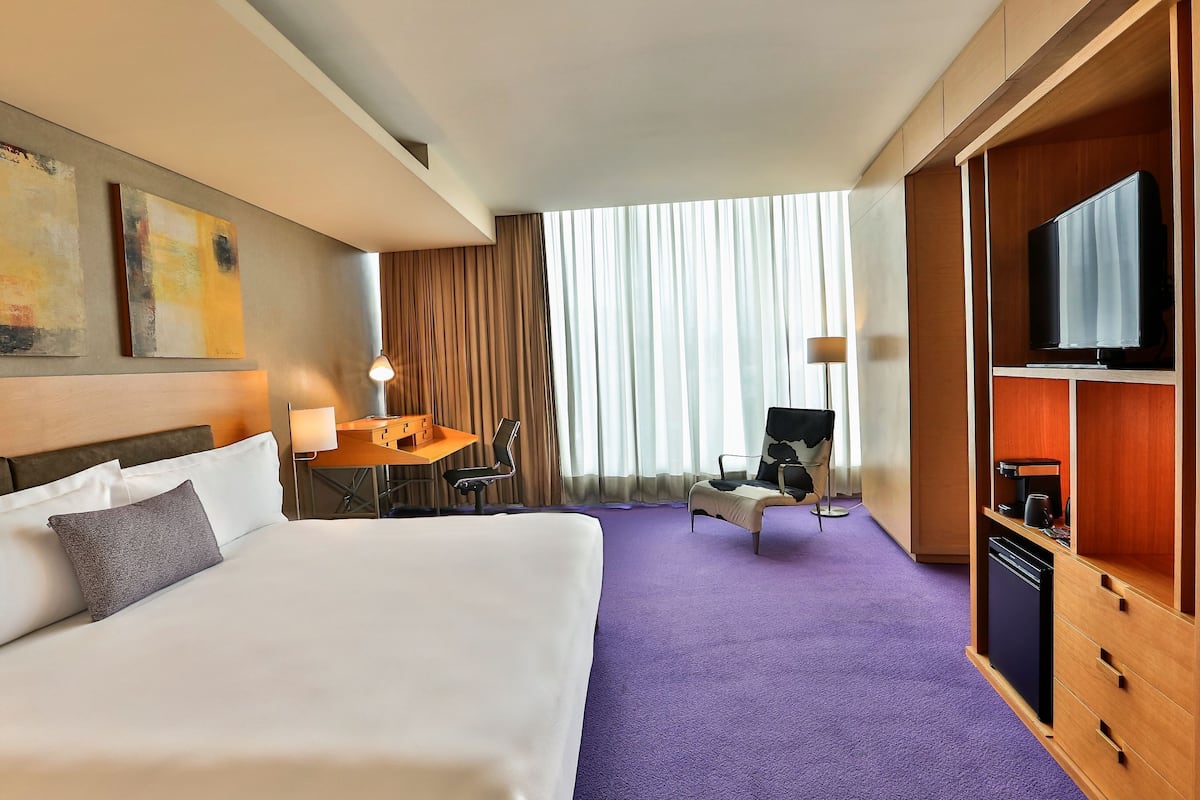 Deluxe King | 1 slaapkamer, luxe beddengoed, een kluis op de kamer, een bureau