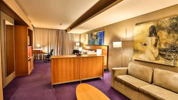 Junior Suite, 1 King Bed | Premium bedding, in-room safe, desk, blackout drapes