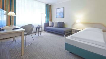 Hypo-allergenic bedding, minibar, in-room safe, desk