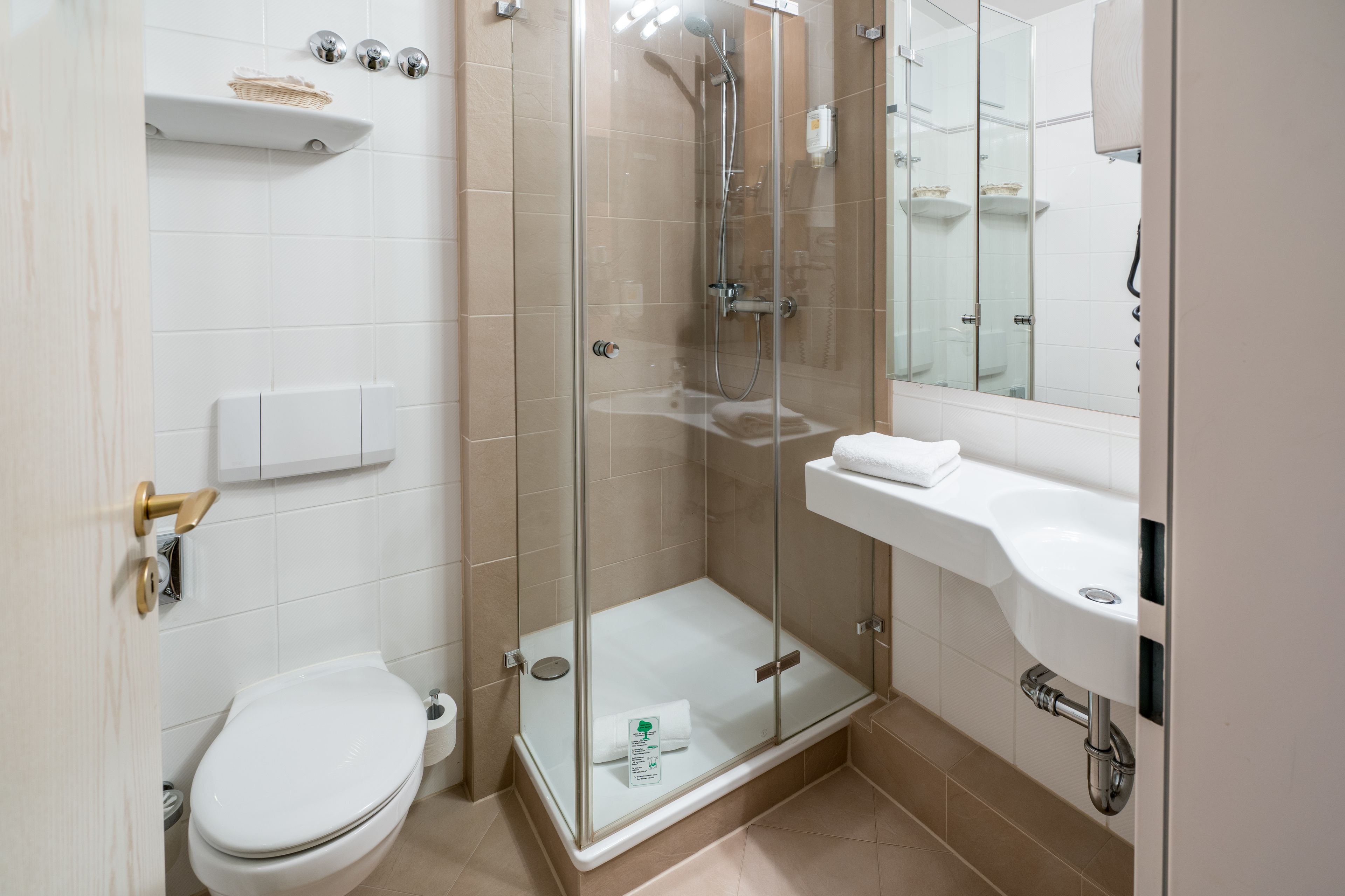 shower, hair dryer, bathrobes, towels