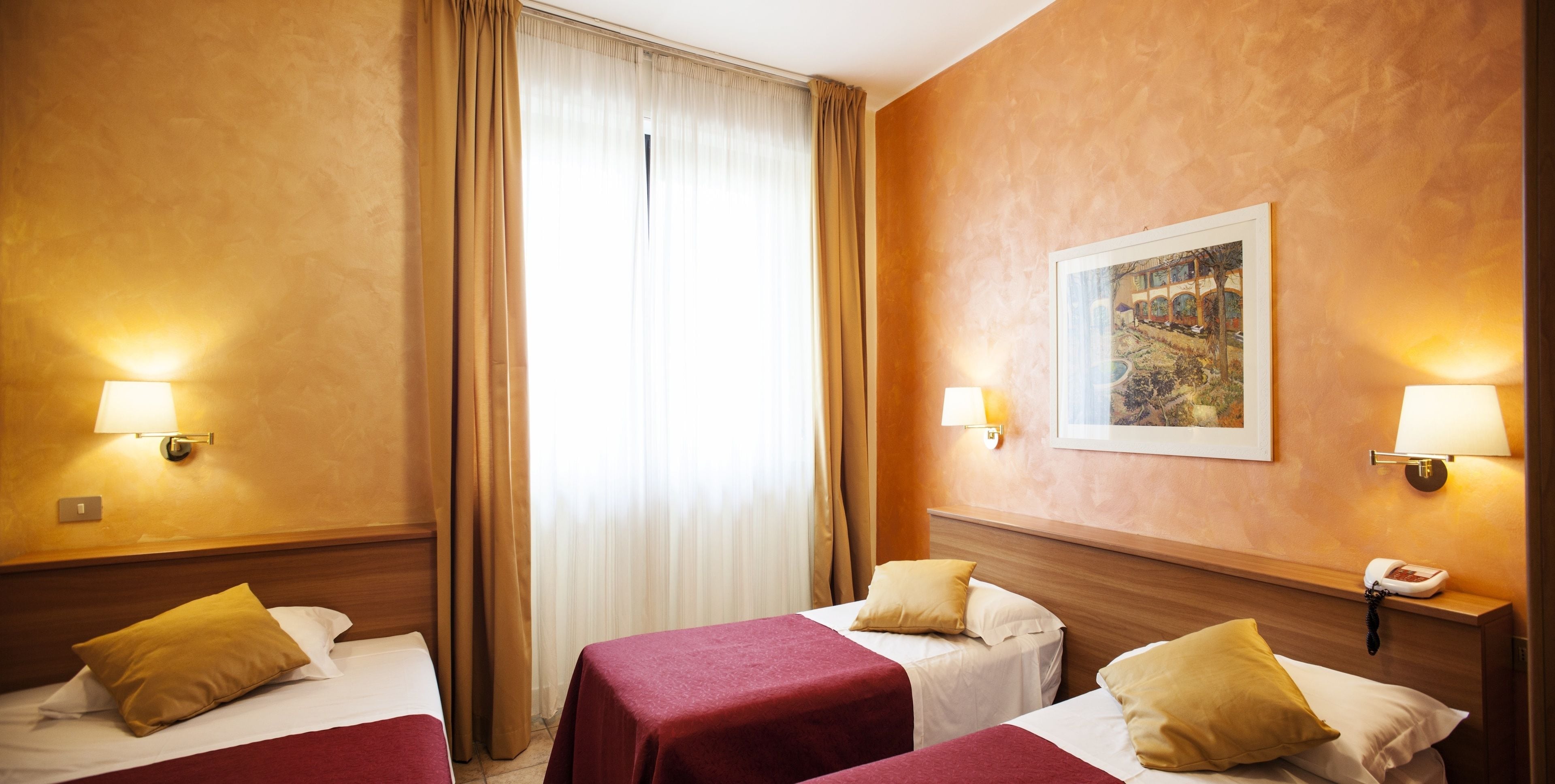 Down comforters, desk, laptop workspace, blackout drapes