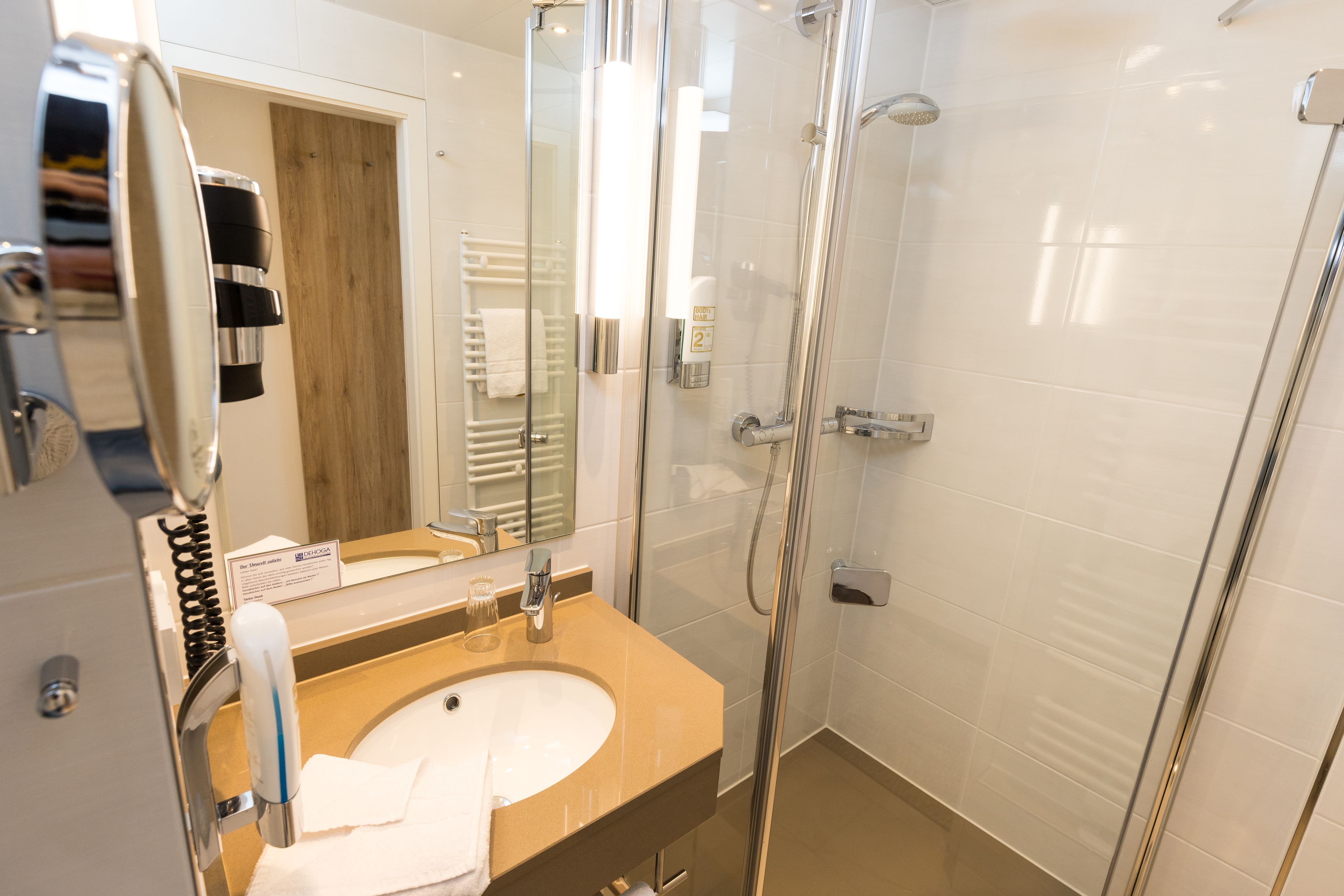 standard single room | bathroom | hair dryer, towels