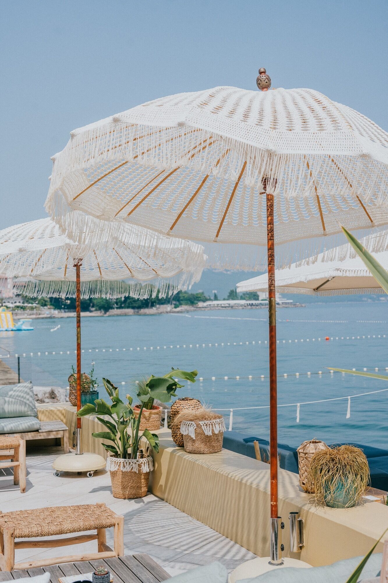 sun-loungers, beach umbrellas, beach towels