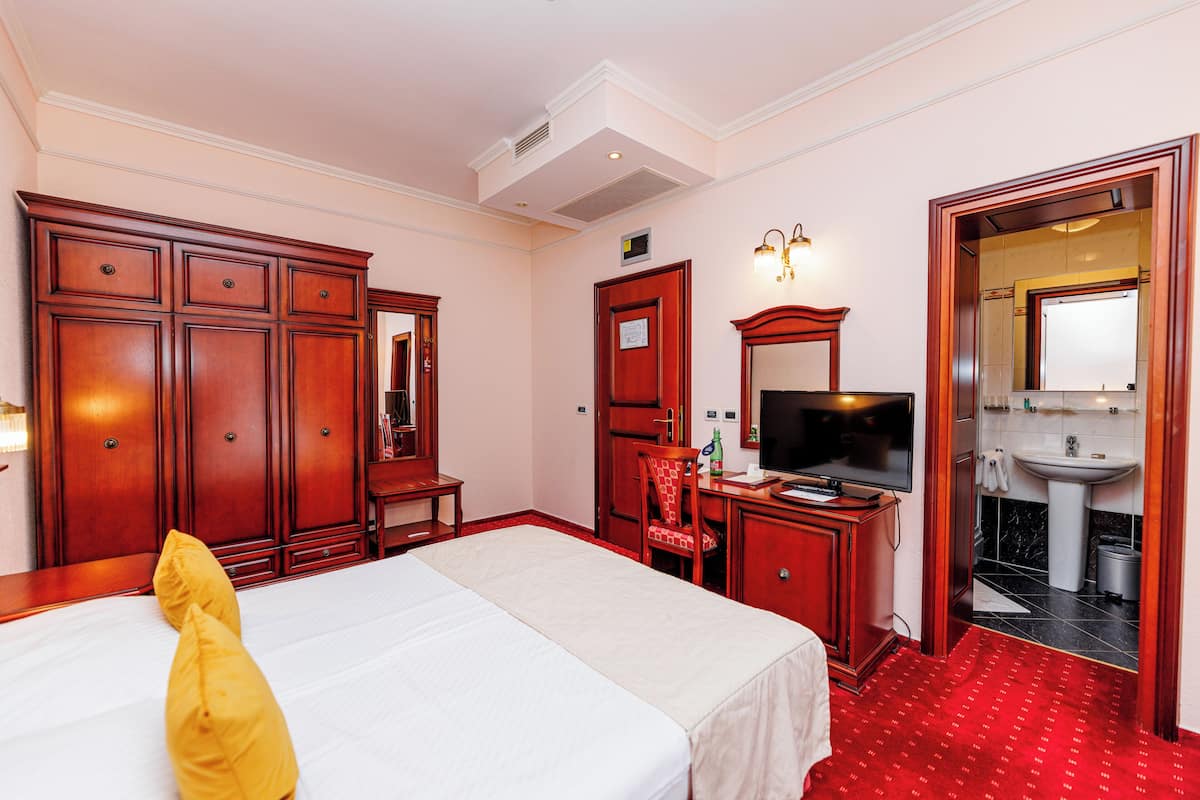 Standard Double Room, Balcony, City View | Down comforters, minibar, in-room safe, desk