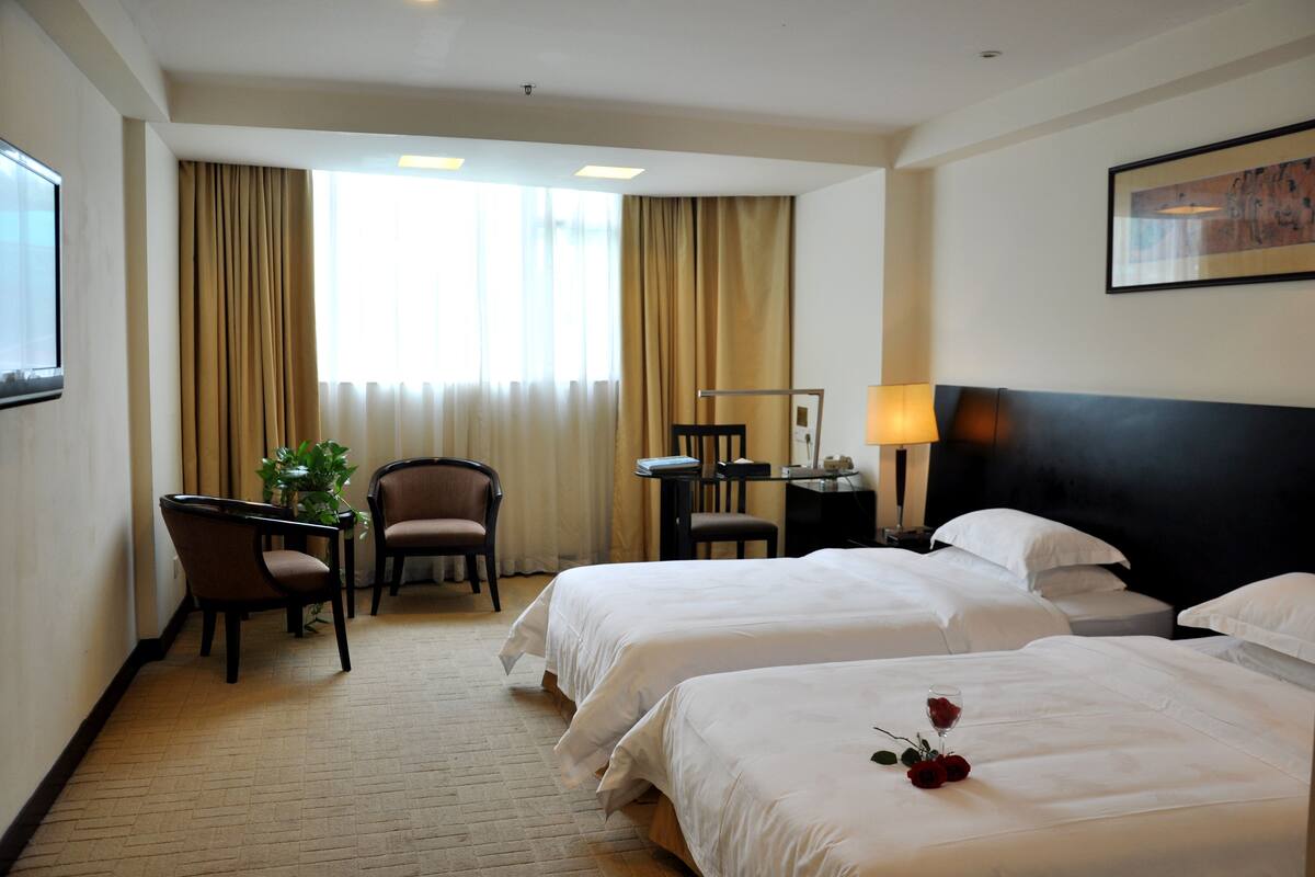 Desk, blackout drapes, WiFi (free), alarm clocks