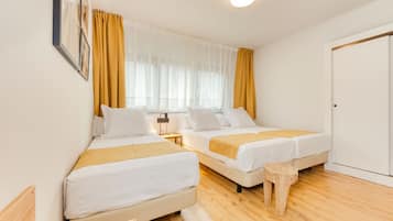 Habitació triple, 3 llits individuals | Bressols gratuïts, wifi gratuïta i roba de llit