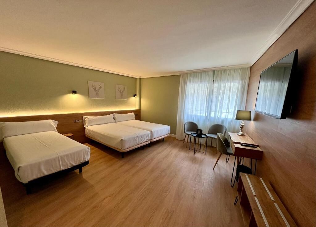Caixa forta a l'habitació, escriptori, cortines opaques i wifi gratuïta 