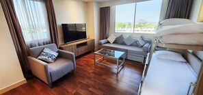 Suíte família, vista para o oceano | Roupas de cama premium, frigobar, cofres nos quartos, escrivaninha