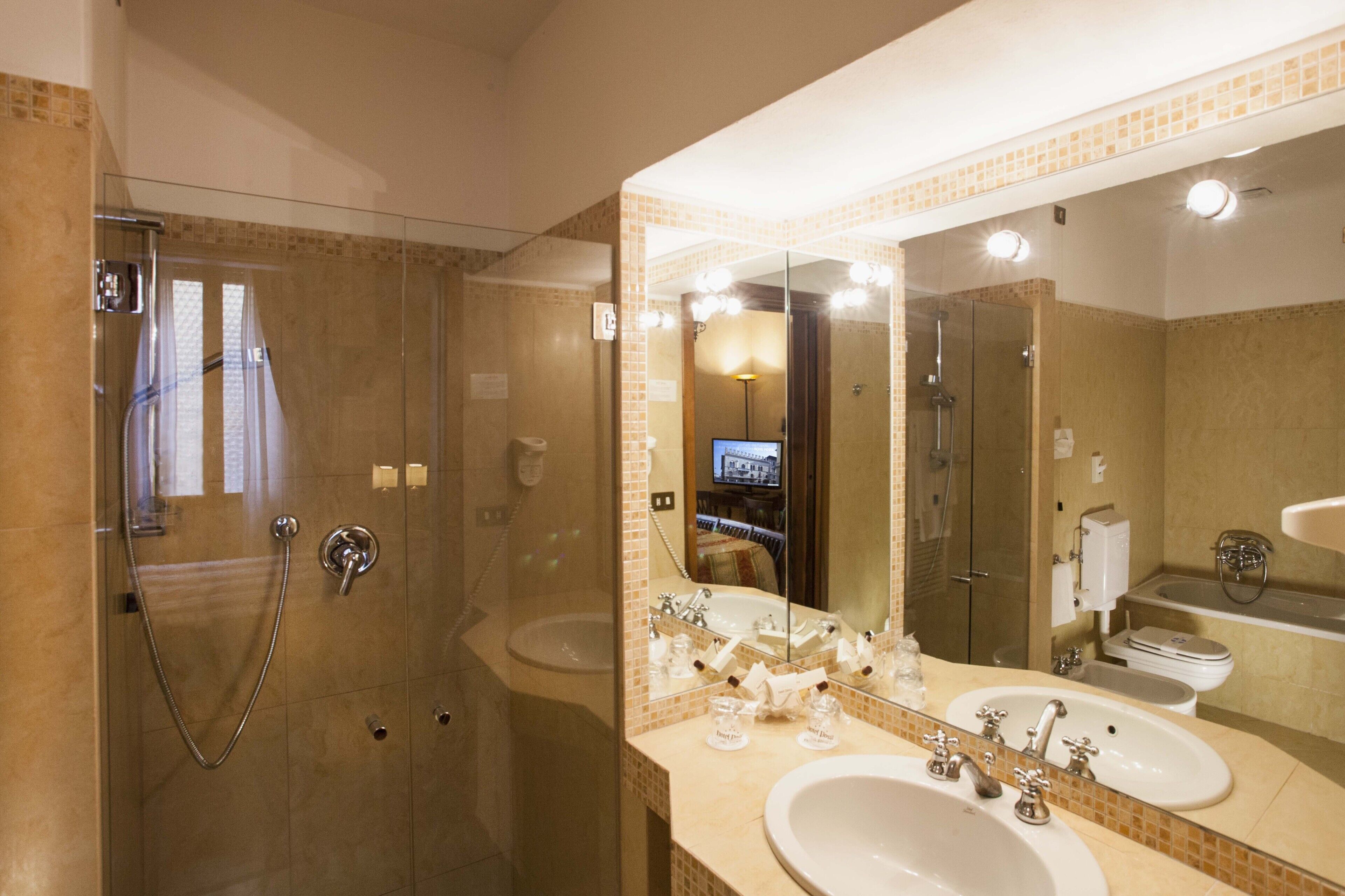 junior suite | bathroom | hair dryer, towels