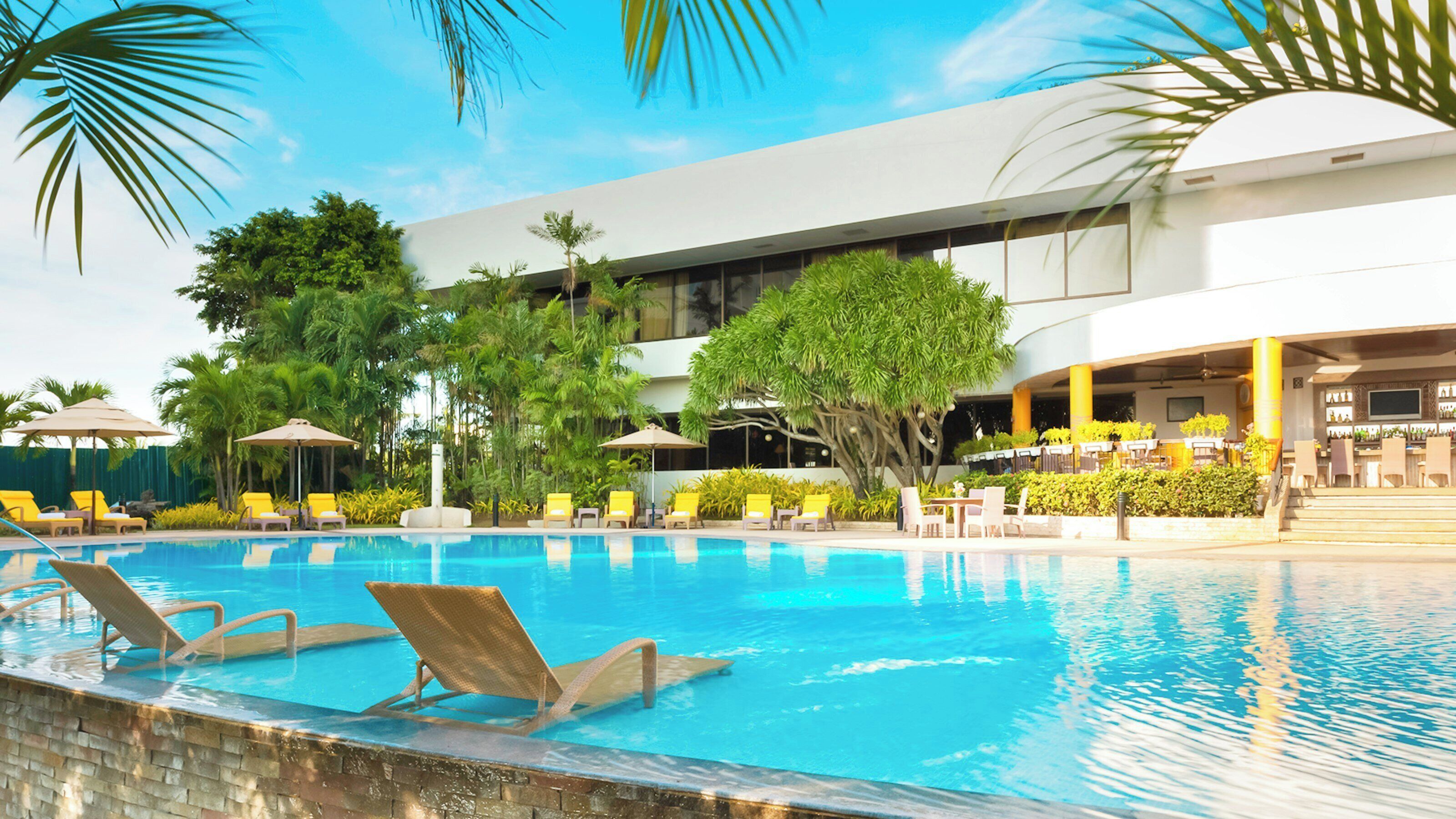 Outdoor pool, open 8:00 AM to 8:00 PM, pool umbrellas, sun loungers