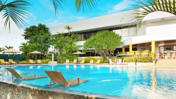 Outdoor pool, open 8:00 AM to 8:00 PM, pool umbrellas, sun loungers