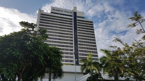 A tall building with the name "Marco Polo" on the top. - Marco Polo Plaza Cebu (Cebu City)