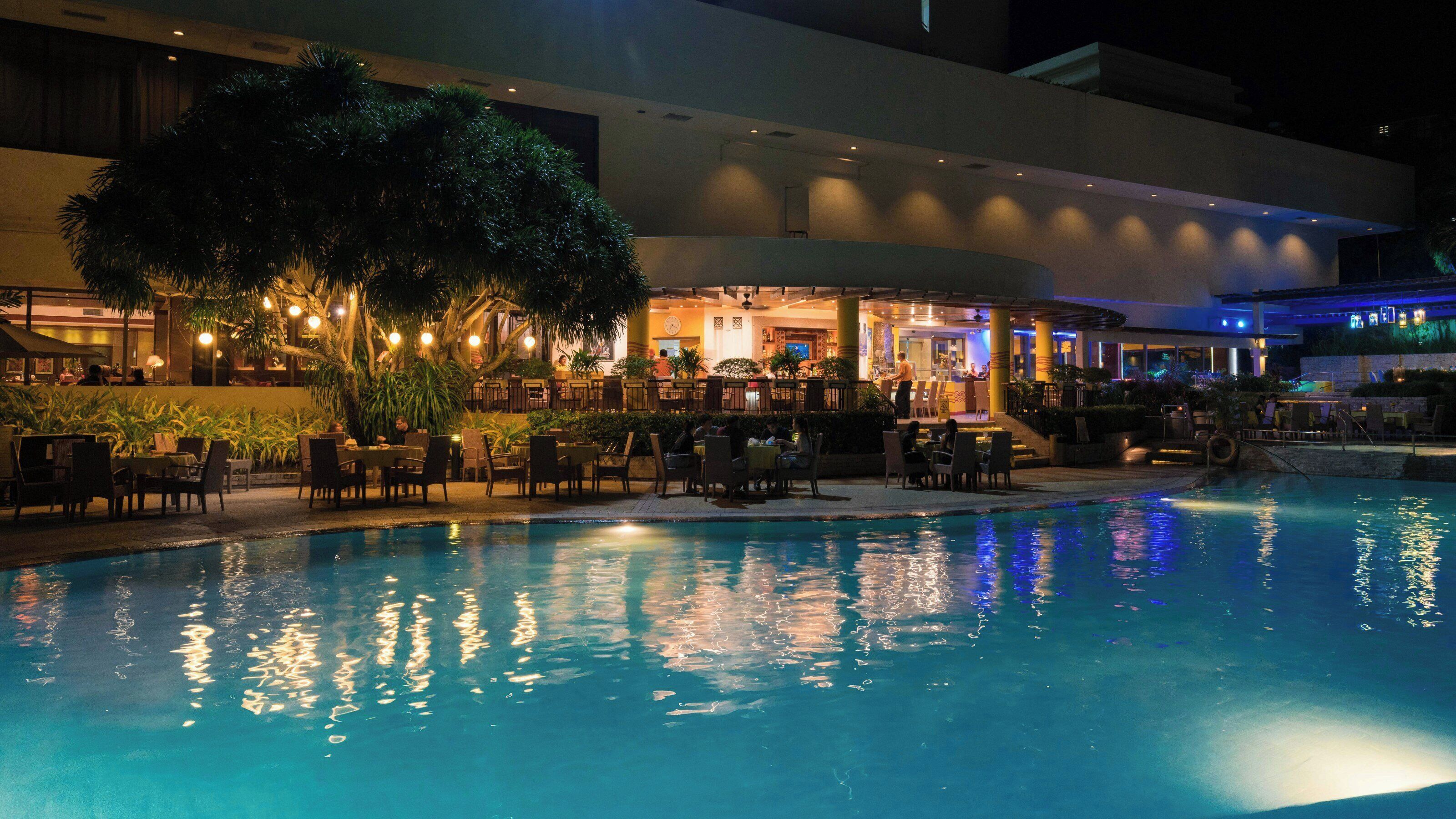 Outdoor pool, open 8:00 AM to 8:00 PM, pool umbrellas, sun loungers